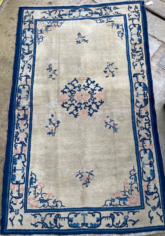 A Chinese rug, 200 x 126cm